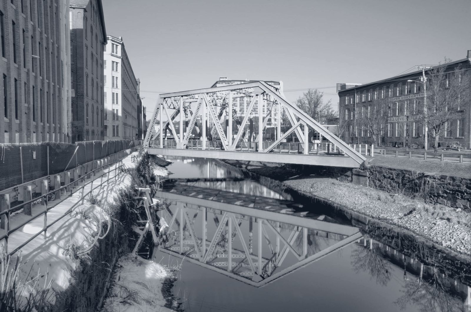 Truss bridge reflected in the North Canal, Lawrence, MA